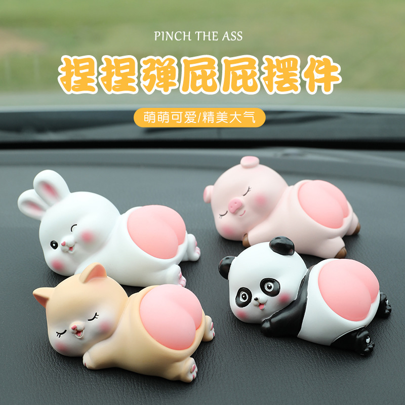 跨境捏捏弹屁屁汽车小摆件可爱创意Q弹公仔卡通小兔车载装饰摆件