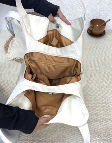2026新款潮小众设计轻奢简约风百搭单肩手提斜挎水桶女包