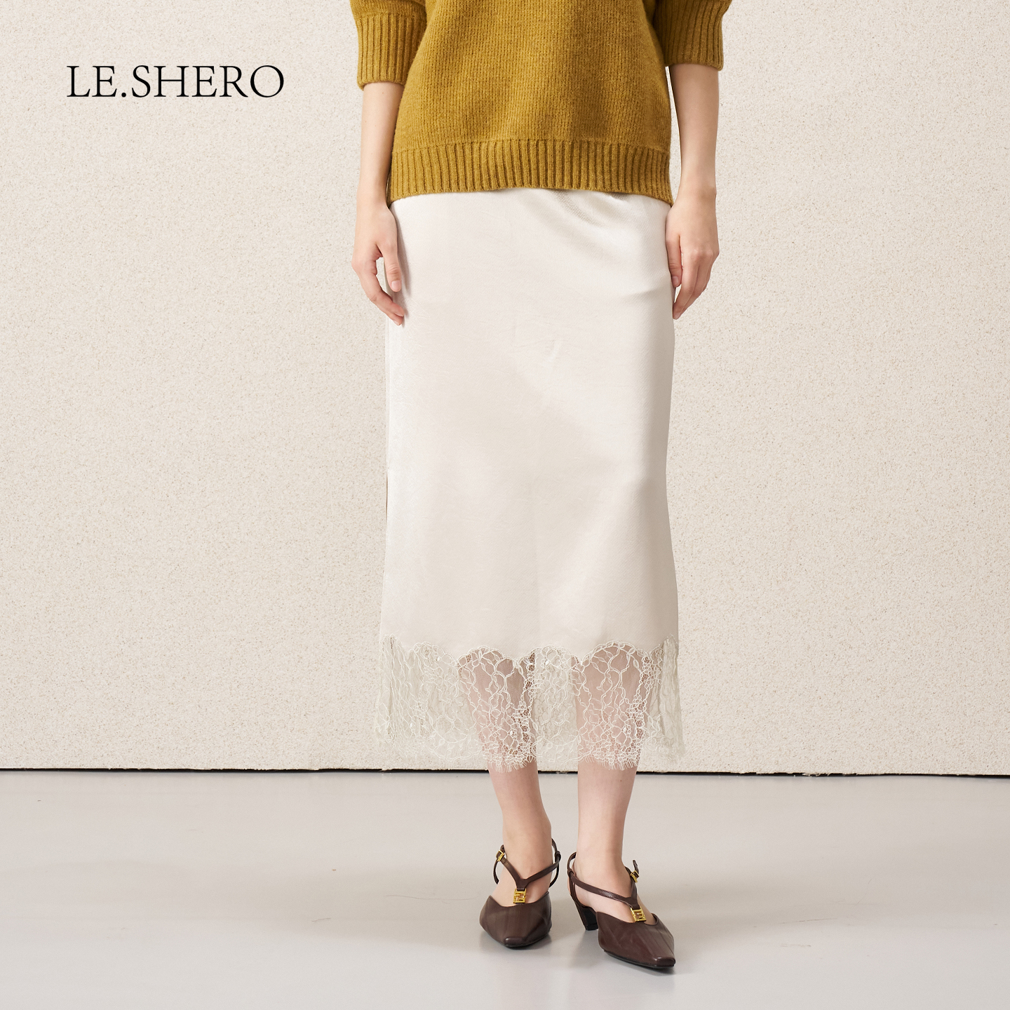时尚蕾丝下摆长半裙女