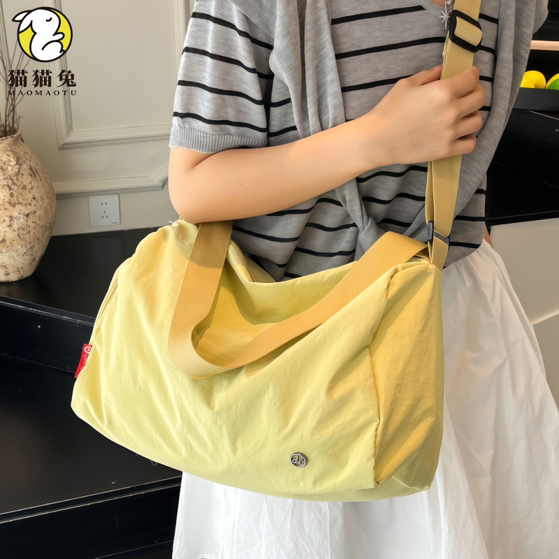 行李袋旅行包女士黄色高颜值2025新款小型轻便极简风短途登机包女