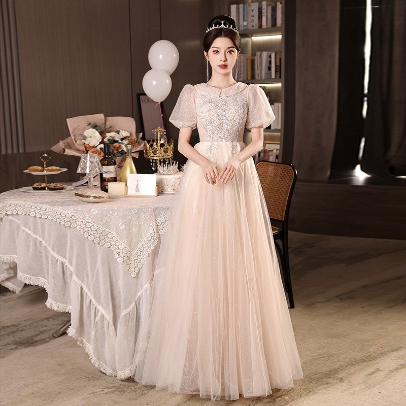 槟色大码晚礼服女2024新款高级感气质轻奢小众高端主持人连衣裙