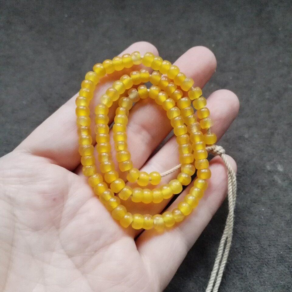 古玩收藏藏区回流老包浆黄色玛瑙珠子一串黄玛瑙佛珠配珠隔片珠