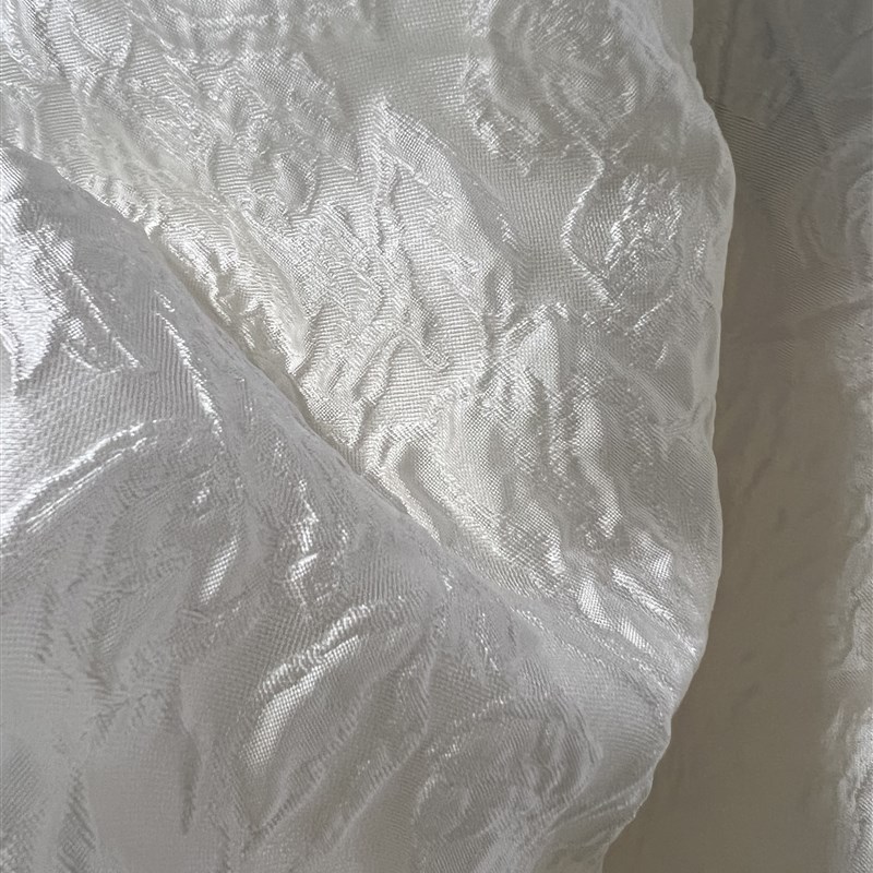 提花布料 浮雕薄款春夏微透奶白色提花连衣裙套装面料
