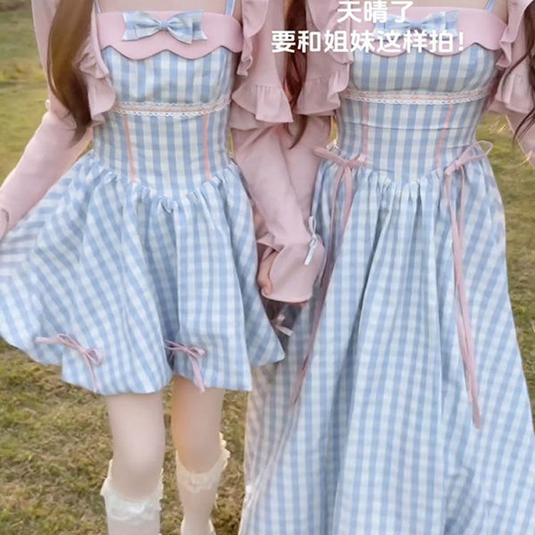 甜美学院风蝴蝶结花苞格