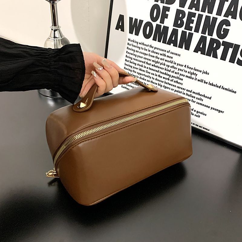 化妆包韩版爆款2024女大容量时尚高级便携高颜值纯色收纳包洗漱包