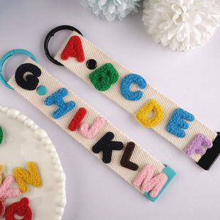 配饰飘带服装辅料字母刺绣钥匙箱包挂件布贴贴布贴补丁毛绒扣新款