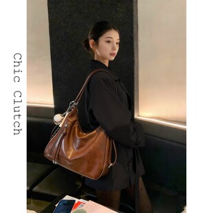 大容量双肩包包女式2026新款单肩斜挎包小众通勤高级感三用托特包