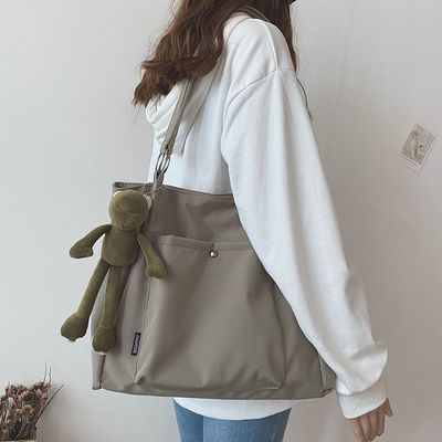可以装电脑的通勤包包女大容量帆布夏小众休闲单肩布袋韩版大学生