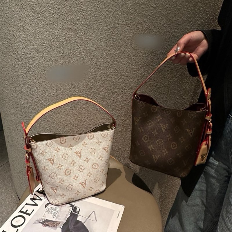 复古印花水桶包女2025新款轻奢高级感百搭老花斜挎通勤包单肩包潮