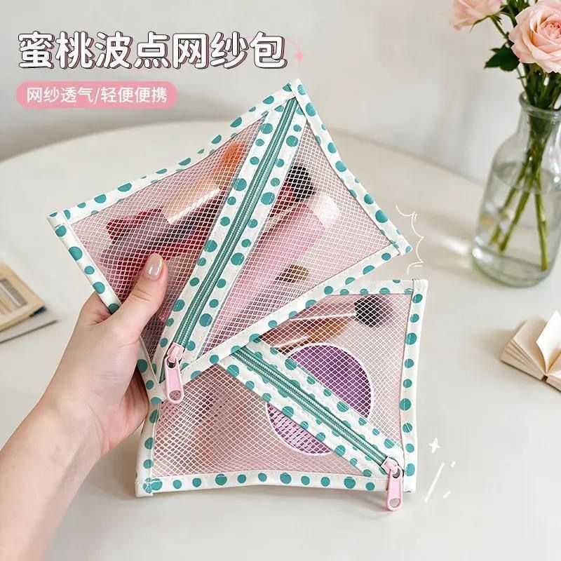 蜜桃波点网纱包外出便携化妆包