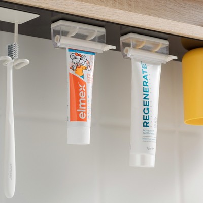 安隅镜柜底磁吸挤牙膏神器儿童挤压器夹洗面奶牙刷置物架上墙壁挂