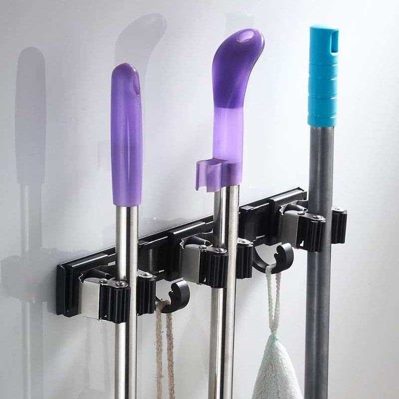 。黑色免打孔带钩拖把架挂钩卫生间墙壁挂浴室挂拖把多功能卡座架