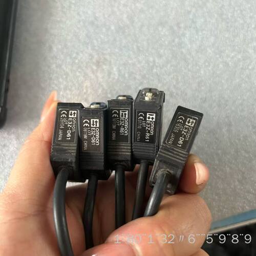 一些光电开关，型号E3Z-D61和E3Z-R61，有