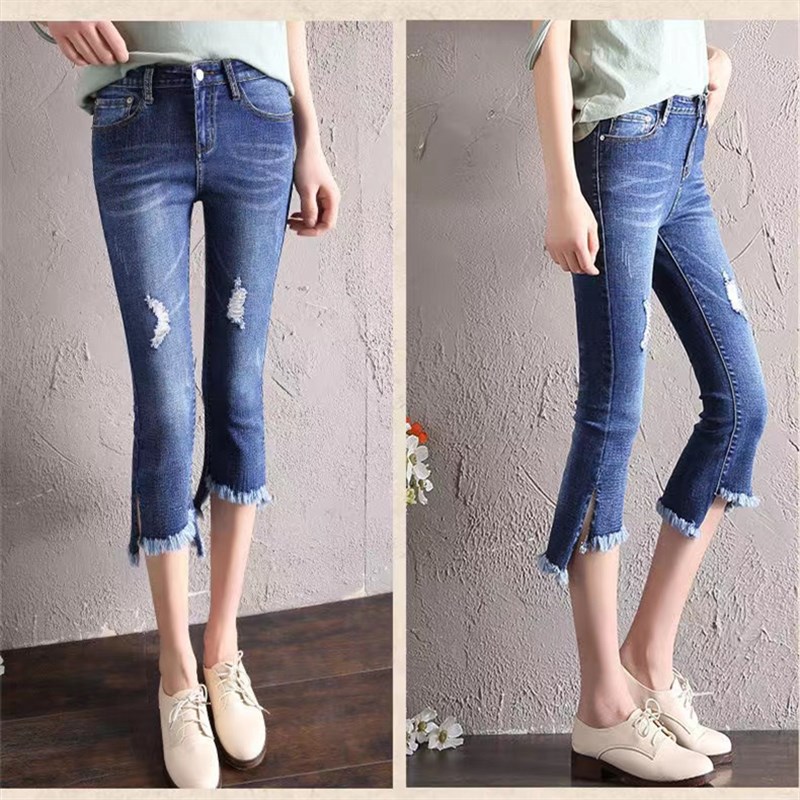 夏季薄款七分牛仔裤女开叉不规则毛絮破洞修身显瘦高腰微喇叭裤子