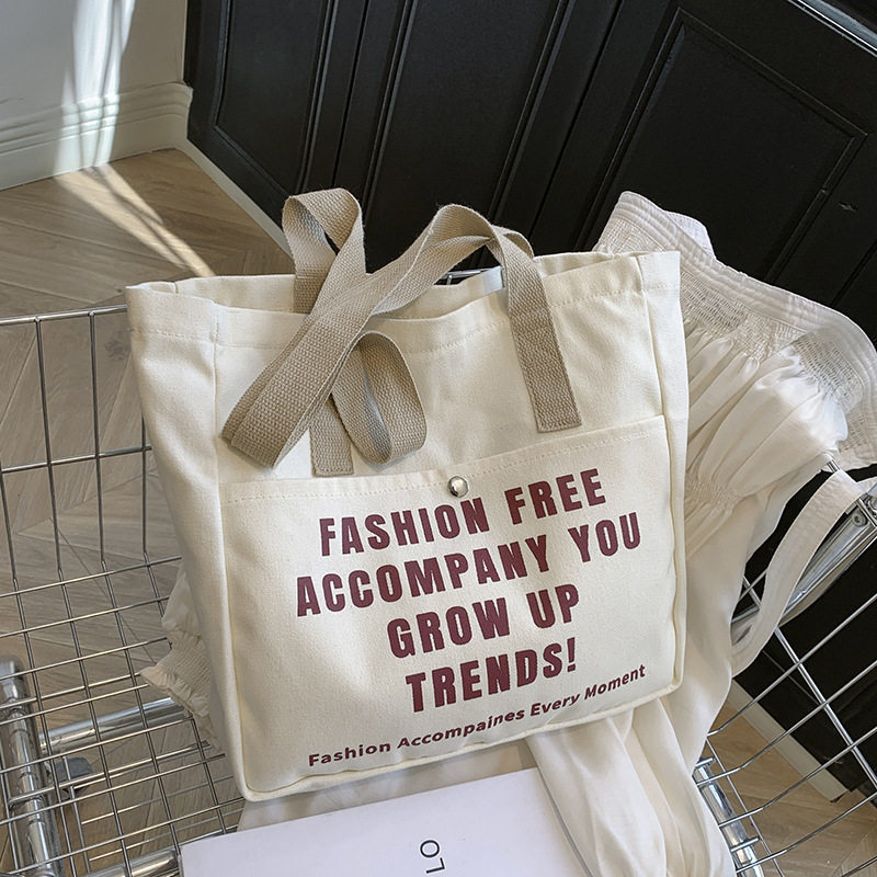 大容量女式高级感通勤单肩帆布包韩版小众设计手提托特包布包批发