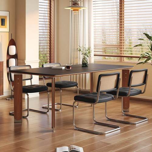 中古风岩板餐桌高级感2025新款小户型实木包豪斯设计师不锈钢餐桌