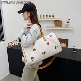 旅行包手提帆布轻便大容量男旅游外出便携健身包短期出差旅行包女