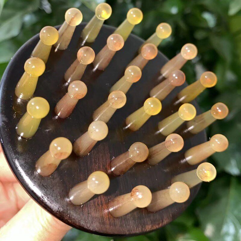 紫光檀镶嵌羊角钉指环王梳子按摩梳天然部经络疗身体刮肚子