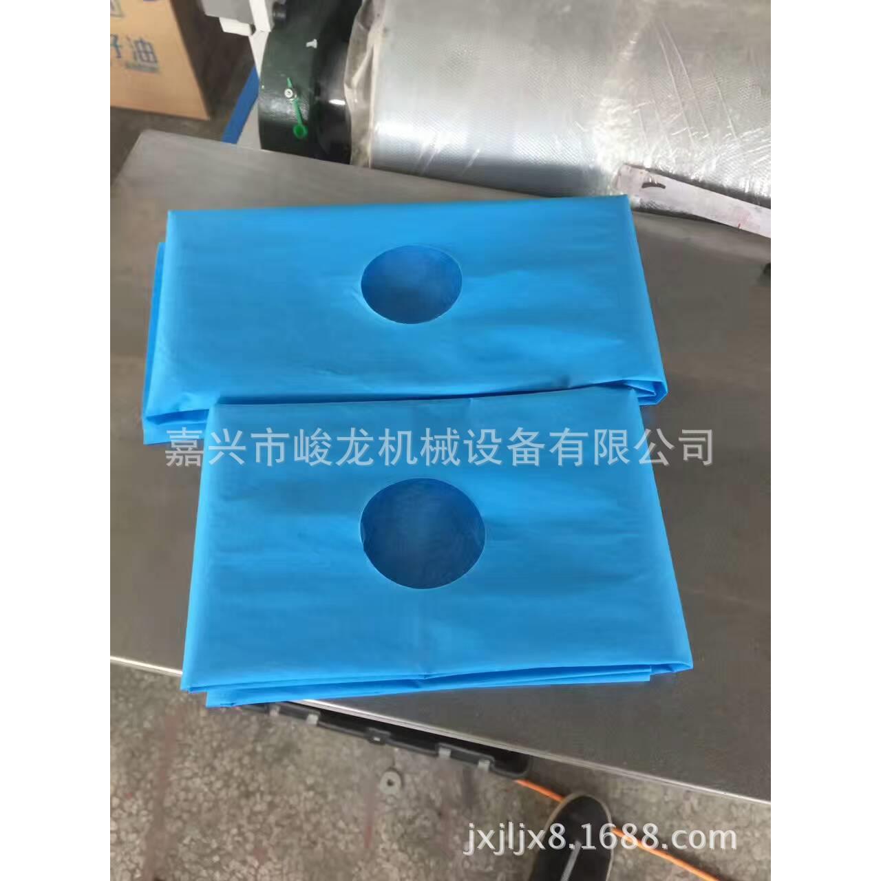 1全自动无纺布床单机太阳孔床单折叠机一次性垫单床单浴巾设备