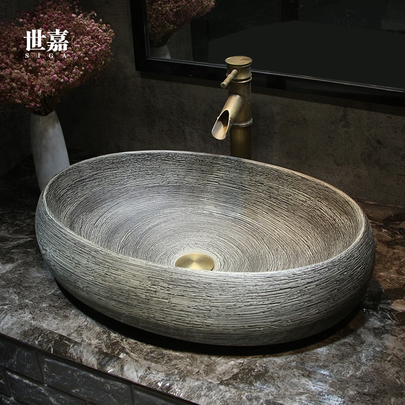 仿古雕刻台上盆仿石陶瓷洗手盆新中式简约洗手盆椭圆大号家用脸盆