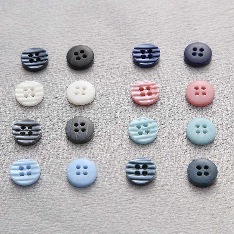 高档树脂纽扣凹凸亮面四孔纽扣衬衫POLO衫纽扣男士衬衫扣子,纺织面料/辅料/配套,服装纽扣,淘宝优惠券,粉丝福利购,淘宝优惠卷