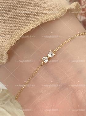 auQDE经典纤细款蝴蝶结手链