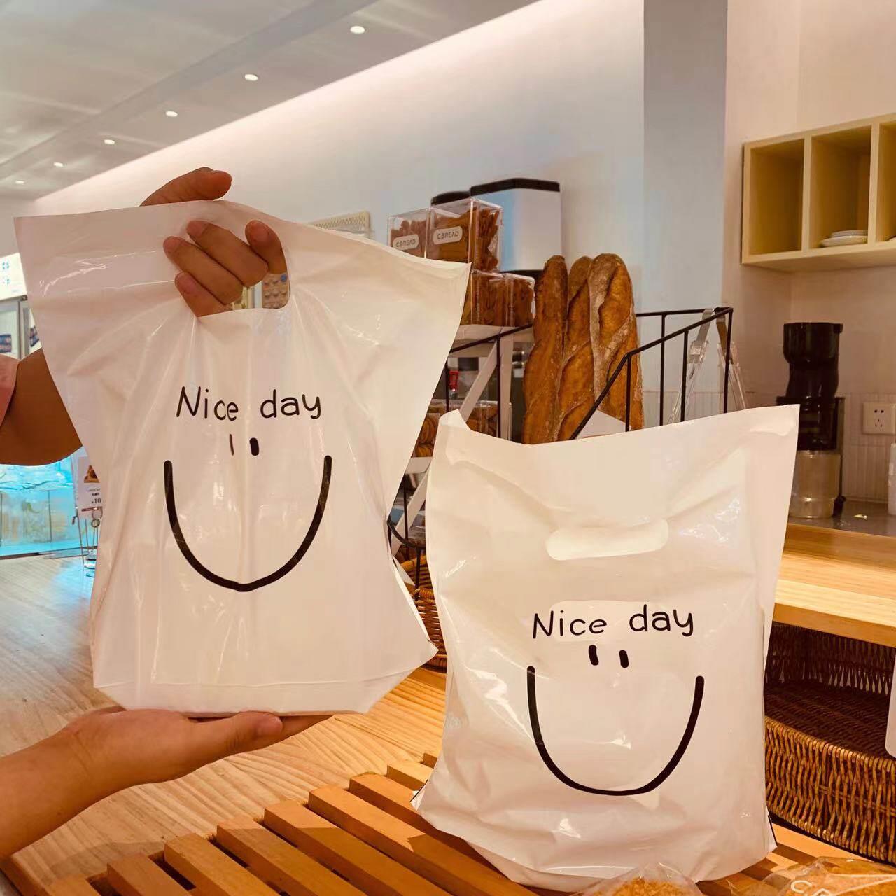 网红白色法文手提食品购物袋烘焙甜点面包西点奶茶塑料透明袋定制