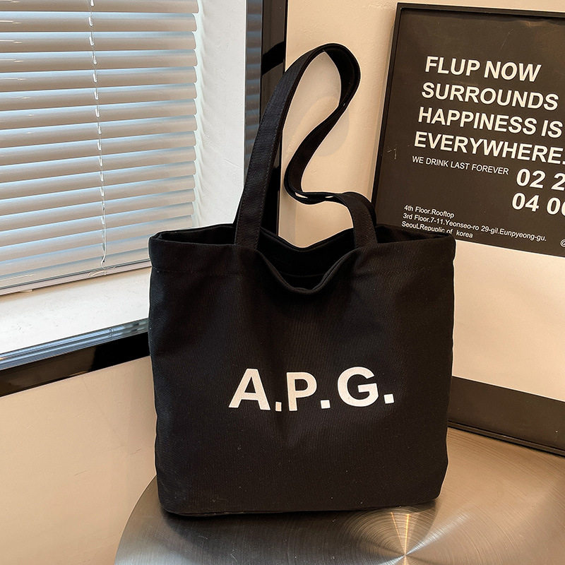 2025小众简约字母帆布包女日常通勤大容量时尚百搭新款休闲单肩