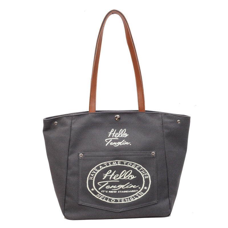 韩版潮休闲大容量帆布包女百搭字母印花通勤手提包上班上课单肩包