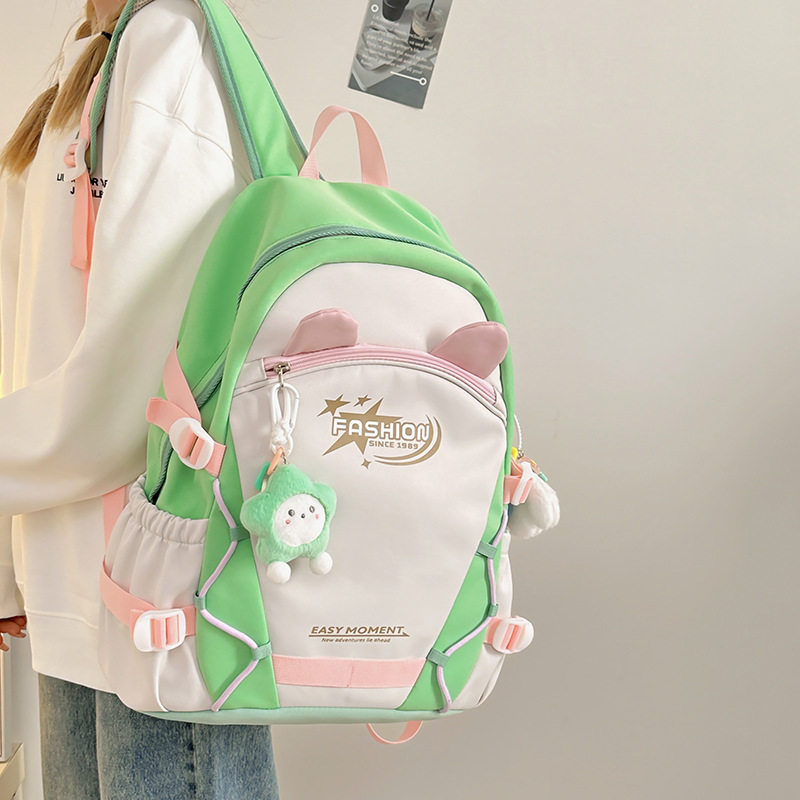 新款可爱撞色学院风背包女双肩旅游轻便百搭初高中大容量双肩包休