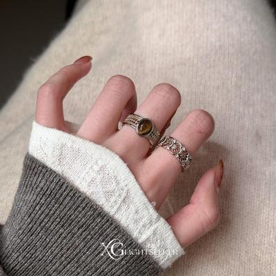 中古镂空雕花仿虎眼石戒指设计感