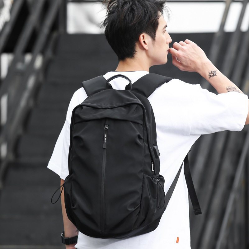 休闲双肩包机能风背包男时尚潮流黑书包中学生初中生大容量旅行包