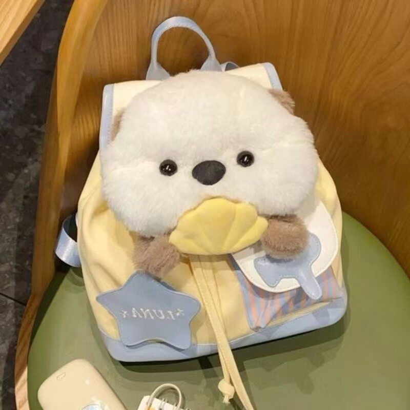 女童背包双肩出游可爱海獭帆布包2025新款轻便男抽绳包幼儿园书包