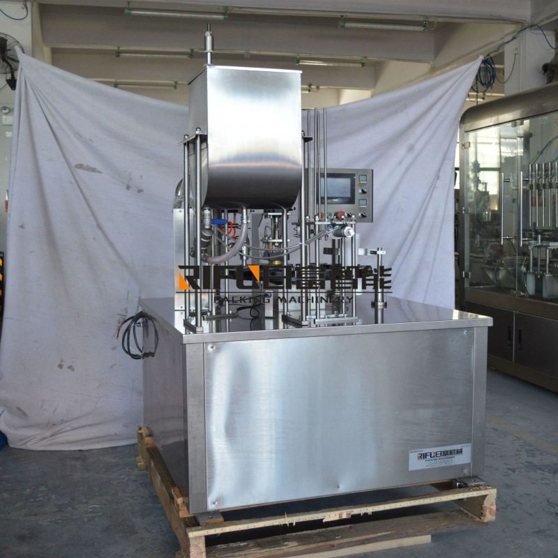 绿豆冰沙灌装封口机 酸奶杯塑杯封口机 全自动蜂蜜勺子机设备厂家