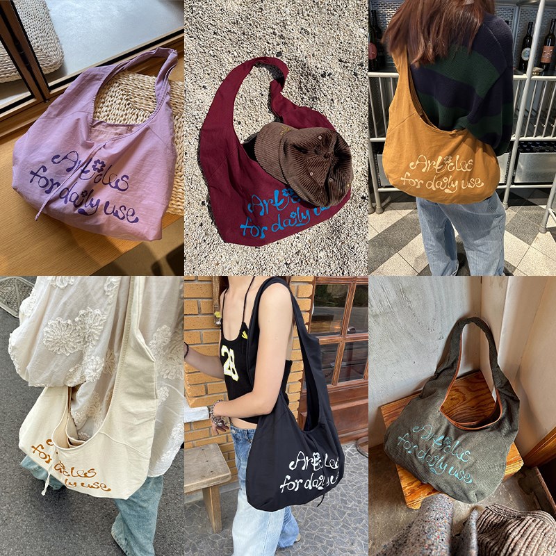 TAVN 字母小花帆布袋斜挎单肩包彩色印花圆弧包百搭帆布包女M星店