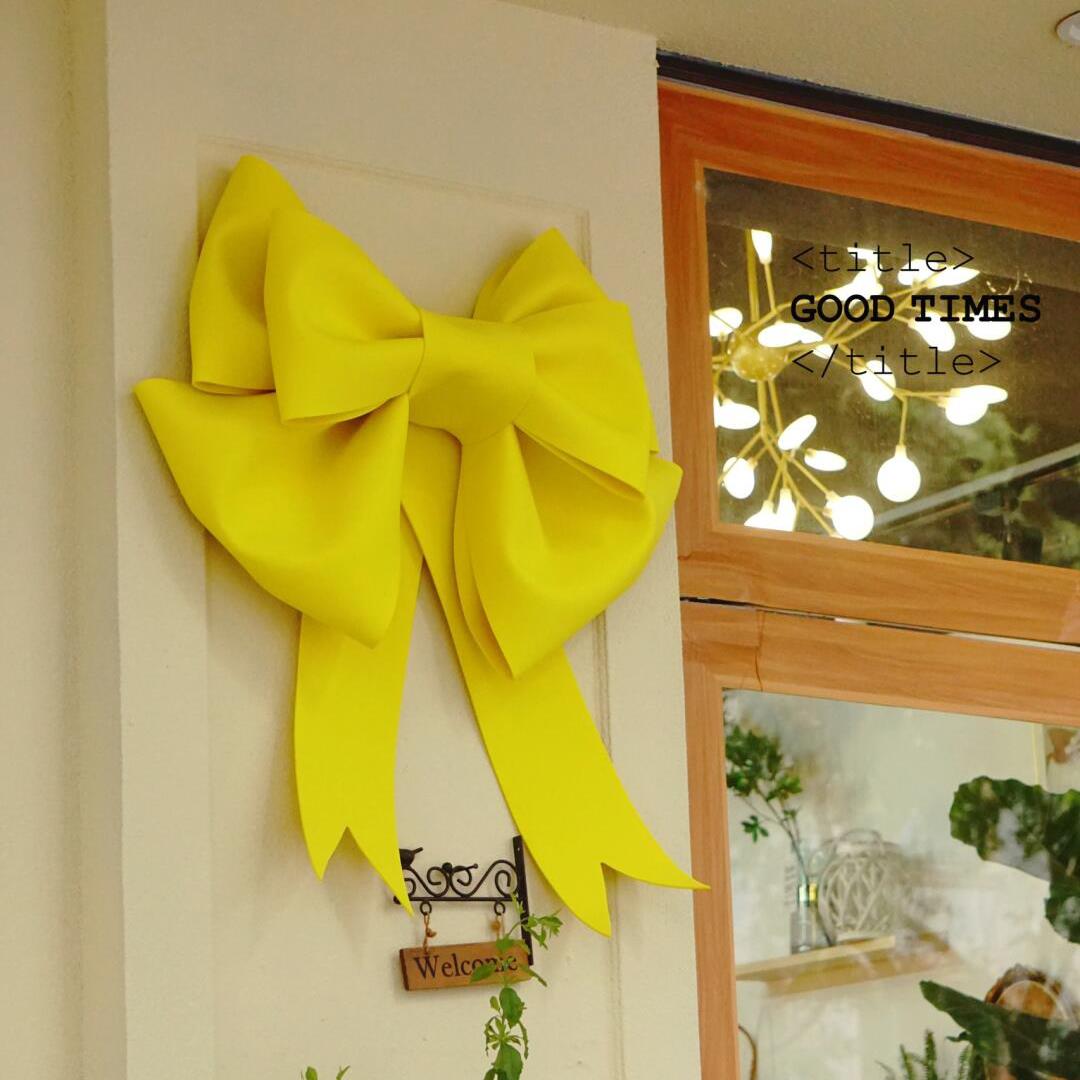 黄色超大蝴蝶结装饰墙上咖啡店铺门头场景布置装饰生日氛围感道具