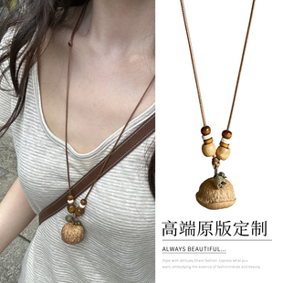 新中式复古禅意果实项链女配饰2025新款吊坠高级感轻奢小众锁骨链