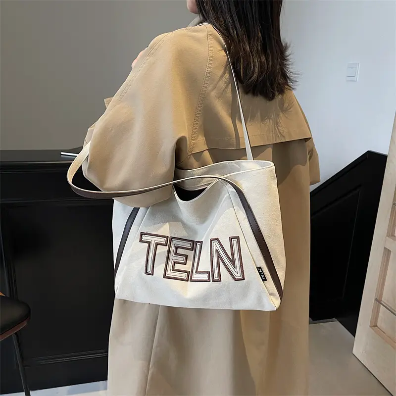 大容量帆布托特包包女2025新款休闲单肩包上课通勤大包外出手提袋