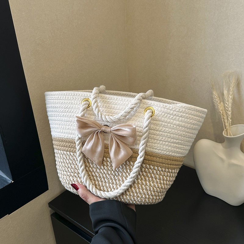 今年流行包包女2023新款夏天沙滩菜篮子手提小众草编编织水桶包