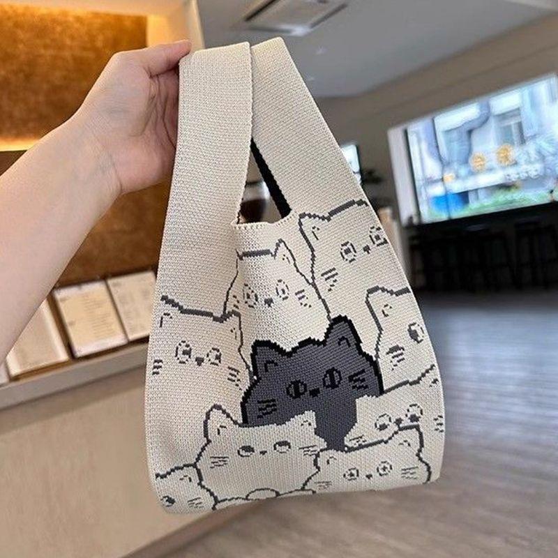 可爱小猫咪针织背心手拎包卡通便捷马甲手提包手腕包上班通勤包包