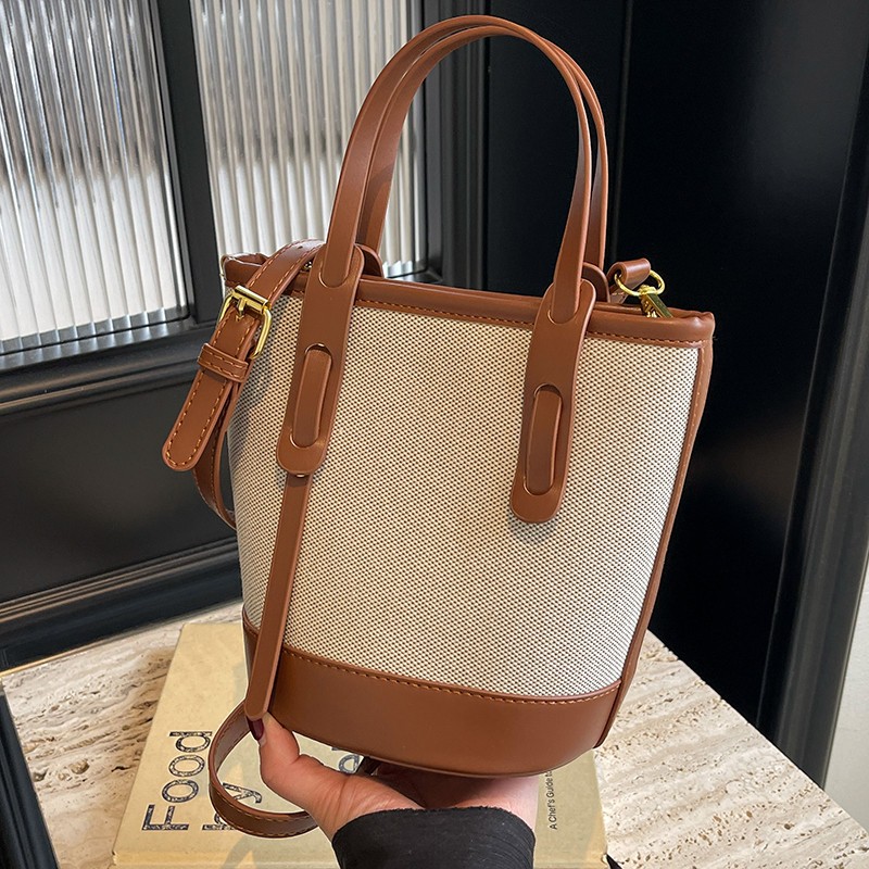 高级感撞色手拎小包包女包2025新款百搭洋气斜挎水桶包时尚单肩包