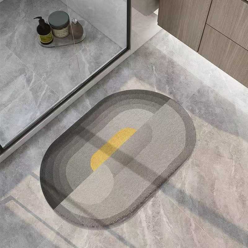 进门踩厕所高级门口家用感灰线条防滑垫地垫简约浴室脚椭圆形地毯