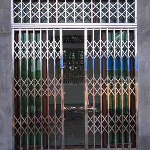 304不锈钢拉闸门室外伸缩折叠入户门阳台推拉双开门通风防盗门窗