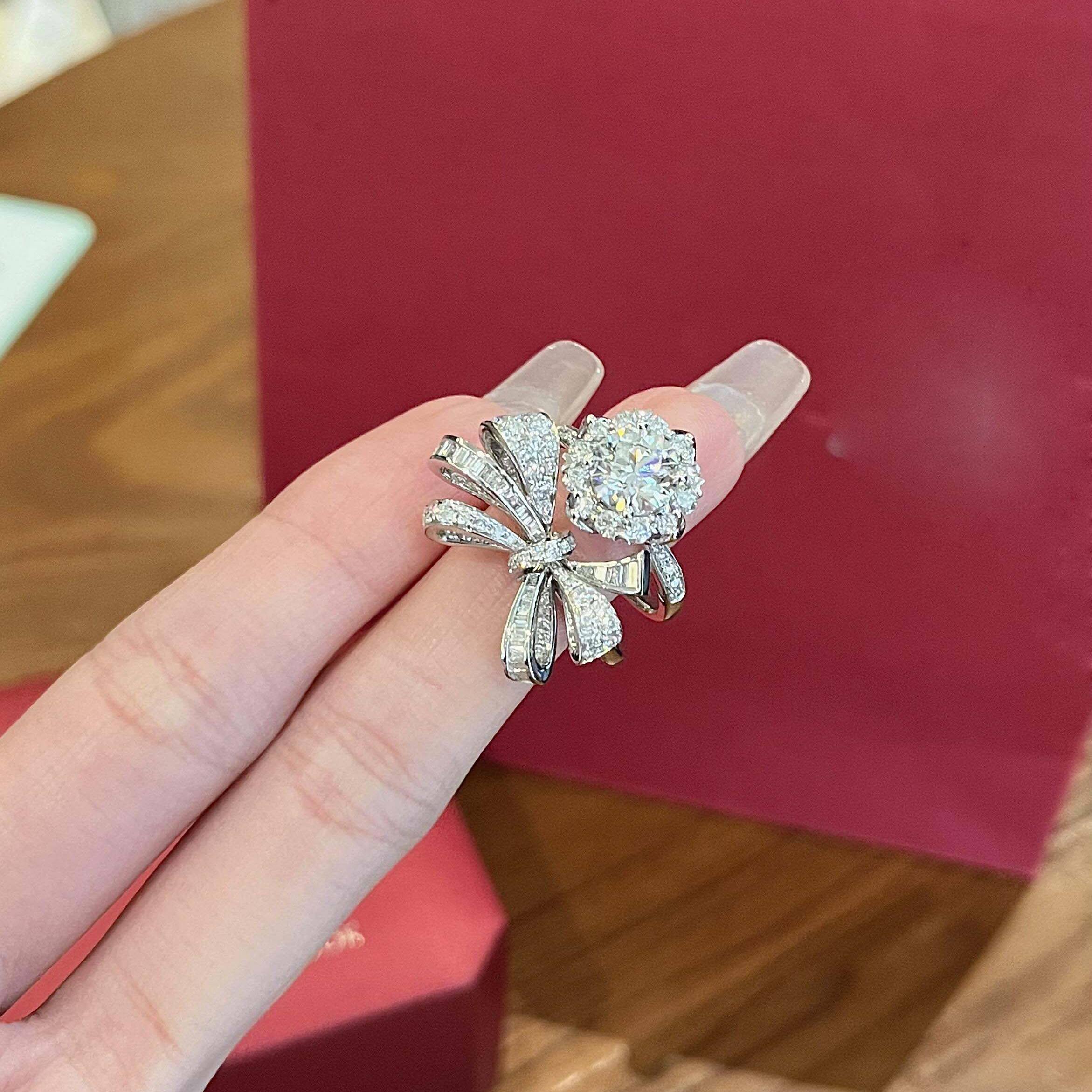 璨蝶舞花形满钻蝴蝶结对戒女