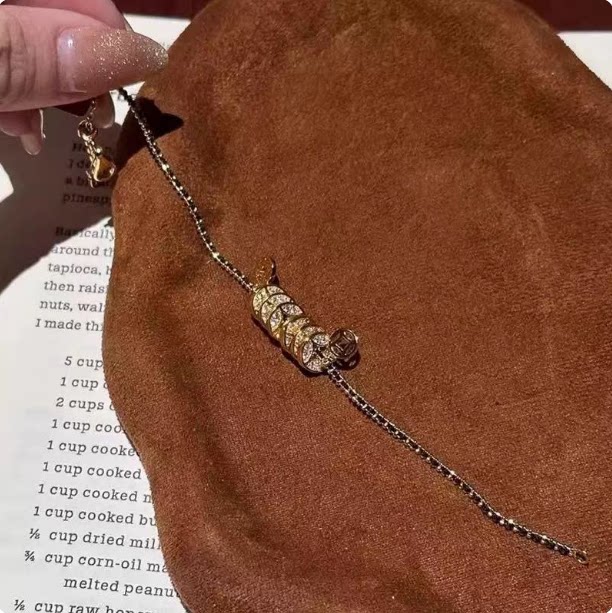 小钱贯黑金编绳小钱币手链