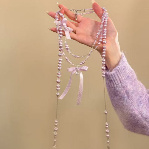 秋冬长款珍珠蝴蝶结项链法式轻奢新娘颈链气质高级感小众设计配饰