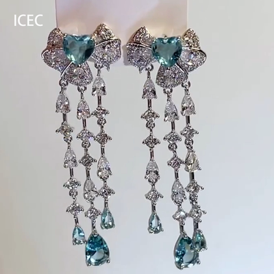 云翼铃兰满钻蝴蝶结流苏耳钉