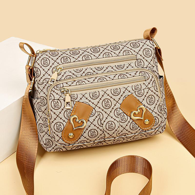 推荐中老年人包包女斜挎包多口袋单肩包女士妈妈包旅游背包牛津帆