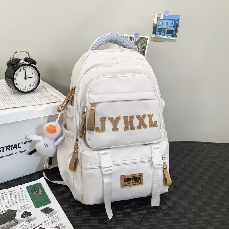推荐书包男韩版小学生3一6年级男生初中女生高中生大学生儿童背包