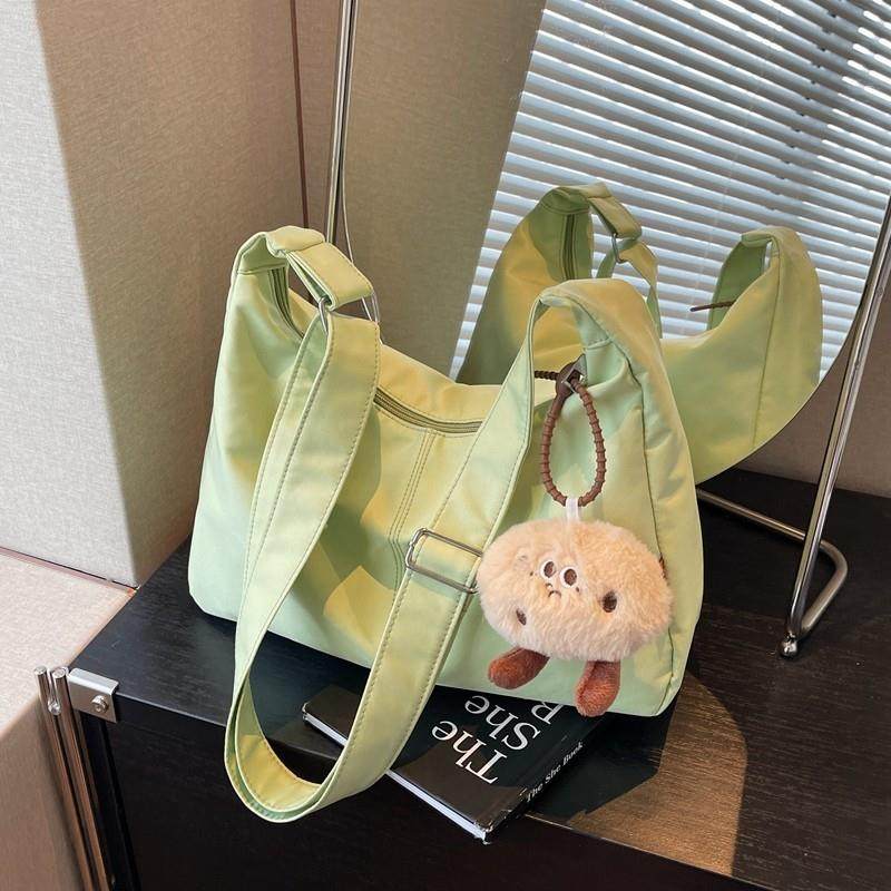 新品简约大容量尼龙帆布包包女休闲学生上课通勤单肩包轻便斜挎托